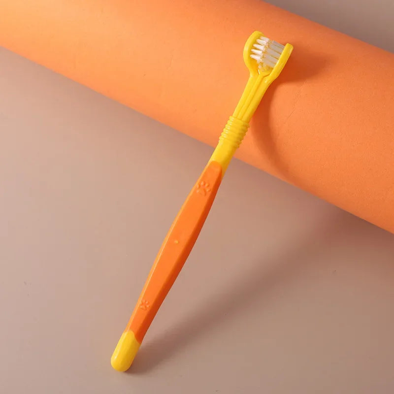 Brosse à dents à trois têtes, orange et jaune